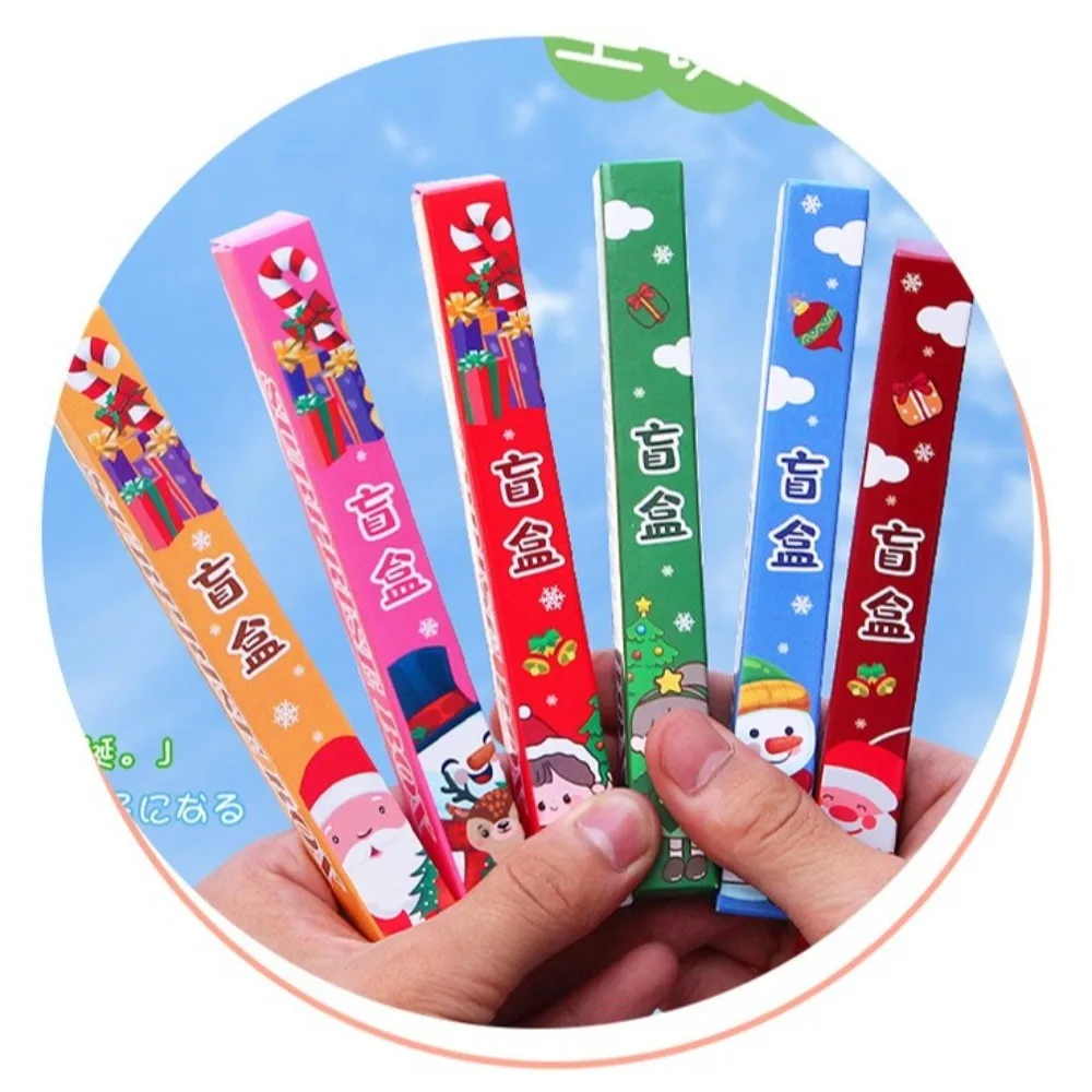 Creativo cartone animato Natale scatola cieca forniture per scrittura pressa ad asciugatura rapida inchiostro nero penna gel strumento di scrittura penna gel regali di Natale