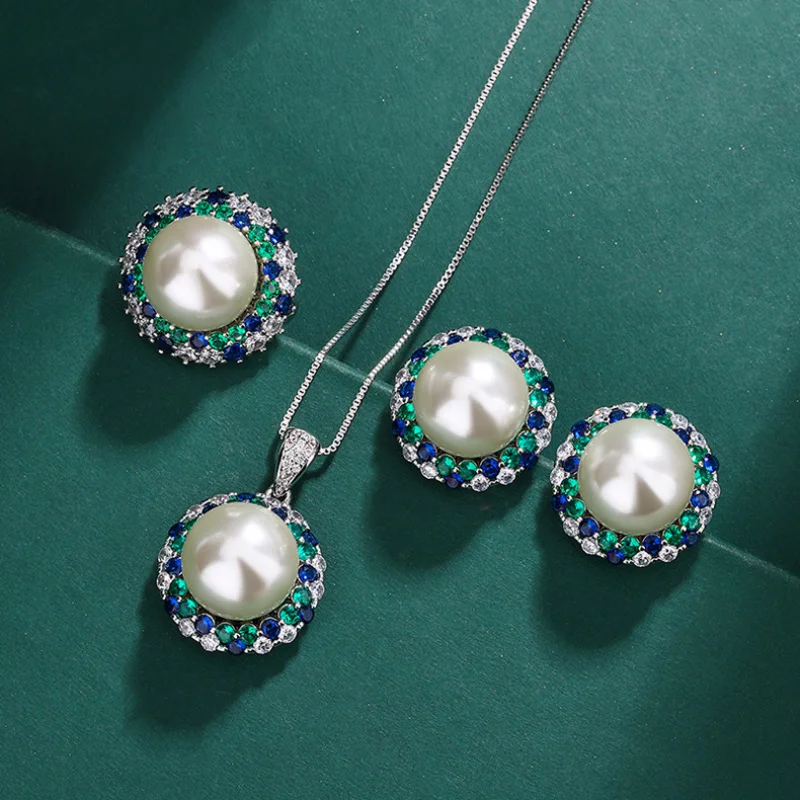 

Three-Piece Set European and American Australian Mother-of-Pearl Necklace Silver Needle Tahitian Pearl Earrings Inlaid with Emer