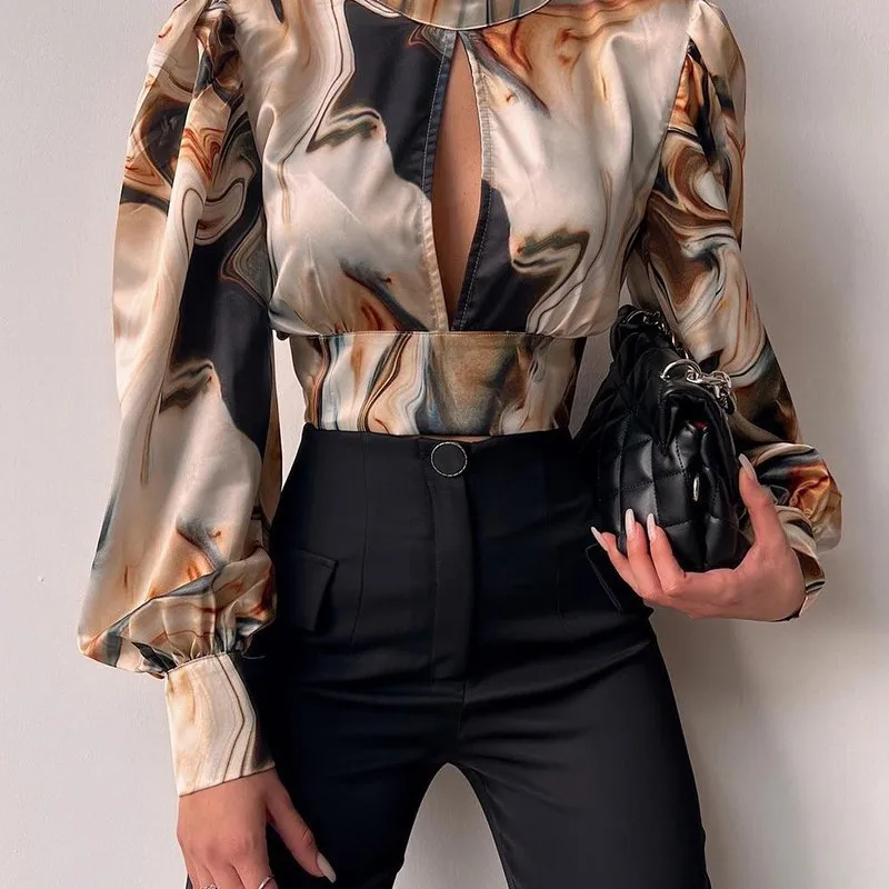 เสื้อครอปแฟชั่นสำหรับผู้หญิง สไตล์เซ็กซี่ โชว์หลัง ลายพิมพ์ แขนยาว ทรงลำลอง เหมาะสำหรับใส่ทำงานหรือไปงานปาร์ตี้