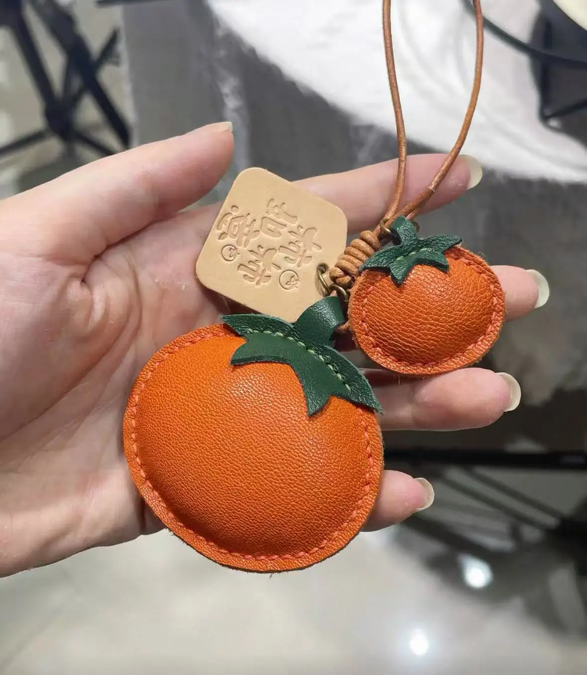 

Imported sheepskin persimmon persimmon ruyi handmade finished products national windmill hanging bag pendant persimmon keychain