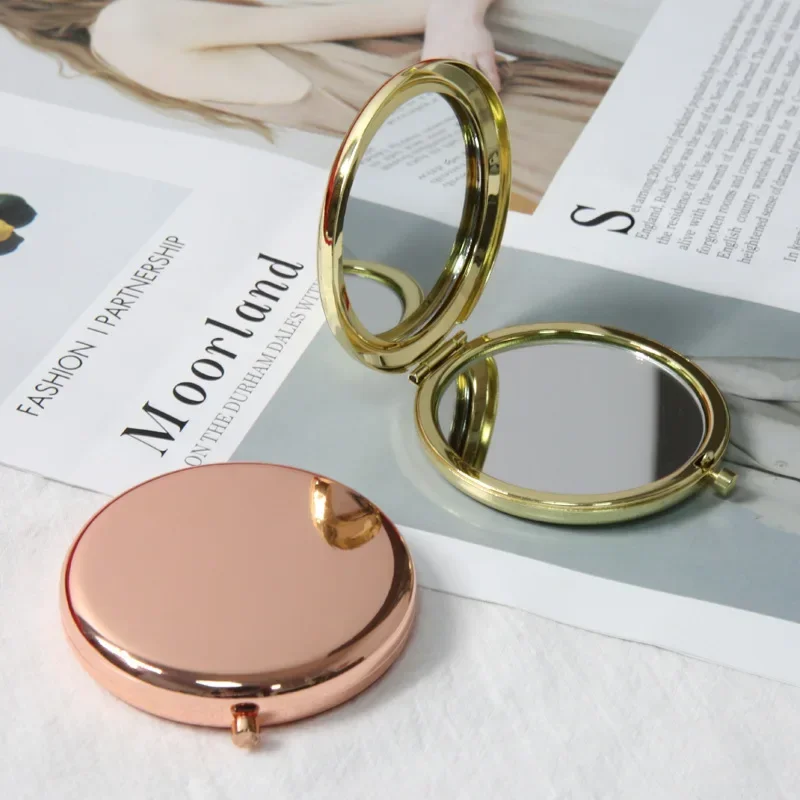 Miroir de poche rond double face en métal, mini miroir de maquillage pliant, tenu dans la main, cadeaux cosmétiques, sac à main de voyage