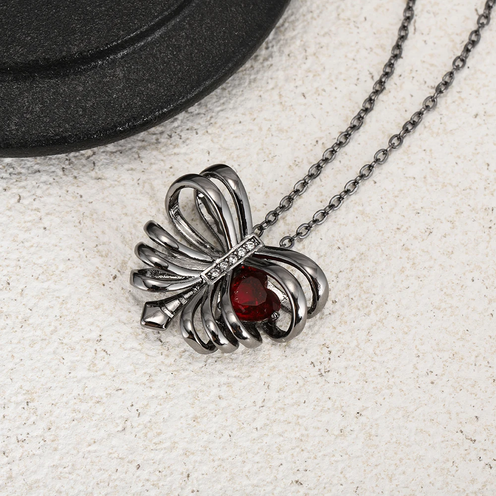 Europa y los Estados Unidos nuevo Halloween punk costilla con incrustaciones de corazón de melocotón circón colgante collar femenino