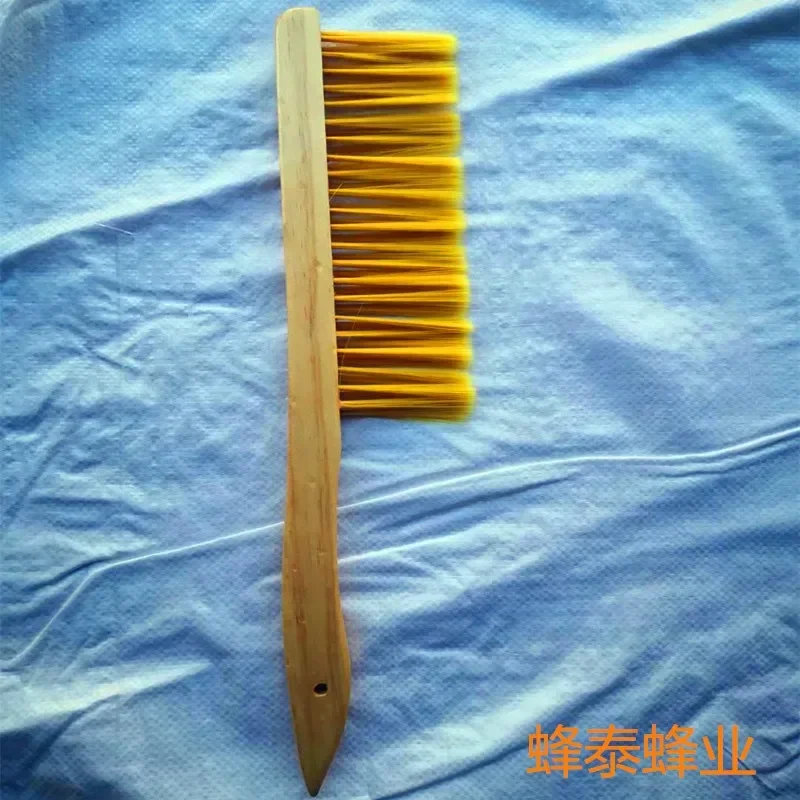A Wooden Handle Bend To Sweep The Plastic Wire Bee