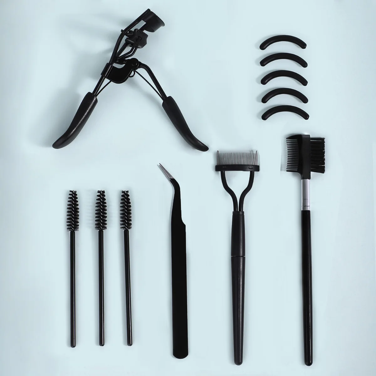 Pestañas con 5 almohadillas de silicona, 1 peine para cejas y pestañas de doble punta, 1 peine de acero para pestañas, 1 pinzas para pestañas y 3 peines en espiral