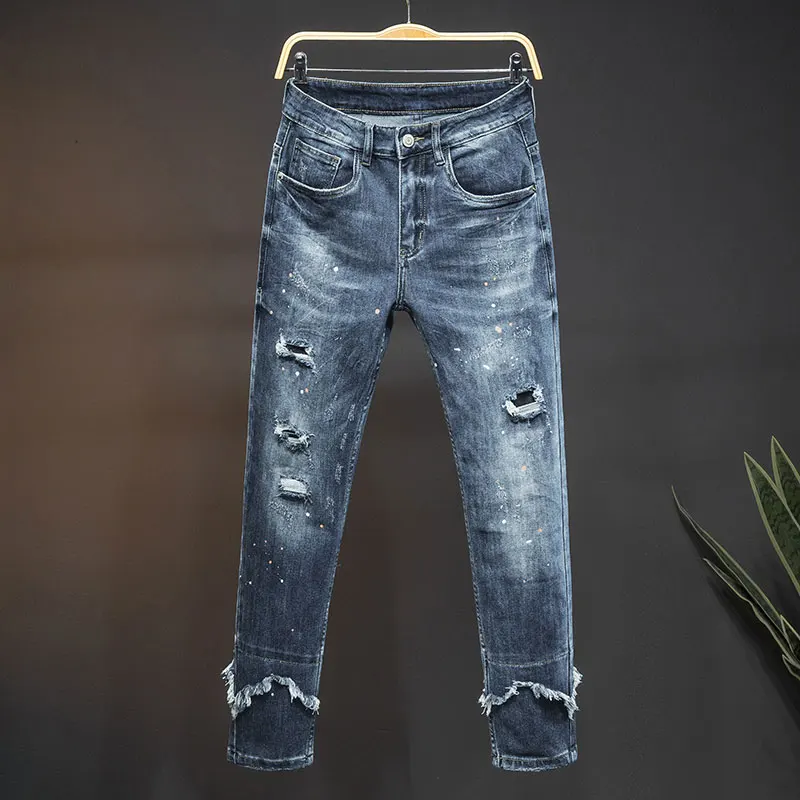 Jeans sobek untuk pria baru 2024 model jalanan kasual desain jahitan elastis slim fit sepeda motor vintage panjang