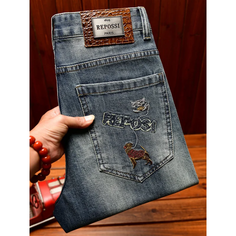 جينز عالي الجودة للرجال صيفي قابل للتمدد من قماش الدنيم بتصميم كلاسيكي عصري ومطرز بطباعة كاجوال بقصة ضيقة وسراويل طويلة للقدم الصغيرة