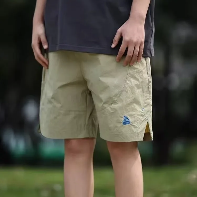 

Модные мужские летние тонкие свободные пляжные брюки из ледяного шелка с вышивкой, студенческие спортивные брюки длиной пять четвертей с разрезом