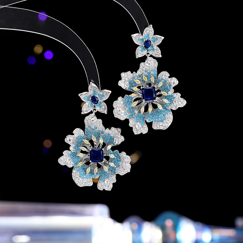 

The new flower-shaped earrings for women, s925 silver needle, are a niche and high-end jewelry piece set with zircon earrings