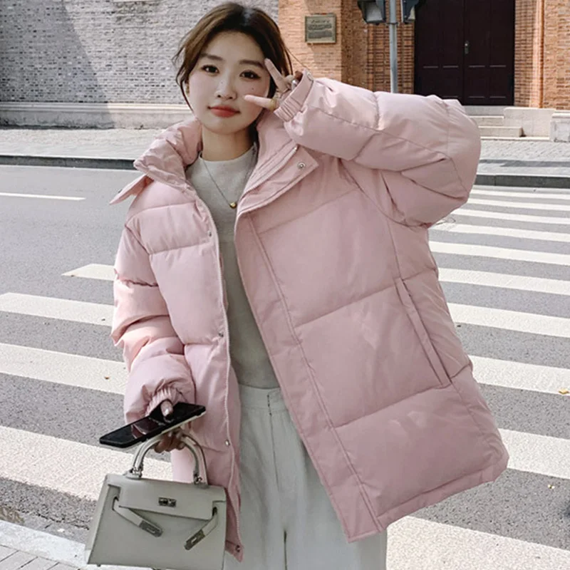 سترة نسائية شتوية عصرية بسحّاب وياقة واقفة وأكمام طويلة سترة نسائية بجيوب بلون سادة مع قلنسوة سترات نسائية