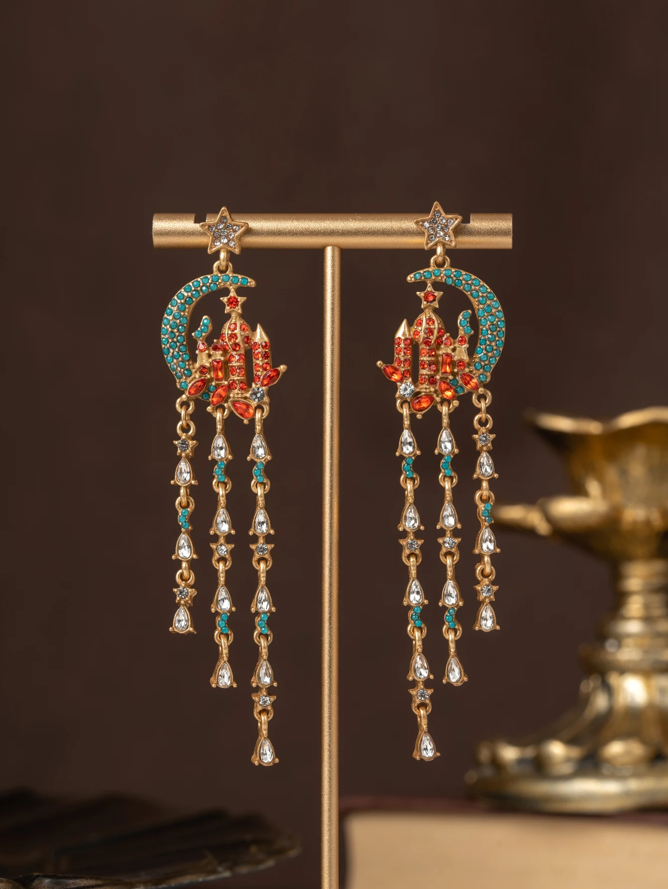 A pair of fashionable star and moon castle earrings with red and green diamond tassels, exotic palace-style party accessories, Halloween gift