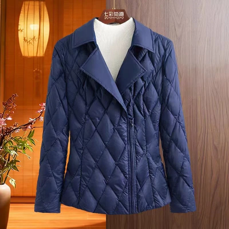 Damska zimowa niebieska kurtka puchowa, ocieplana, lekka, z wypełnieniem z kaczego puchu, idealna na narty, śnieg i na co dzień.