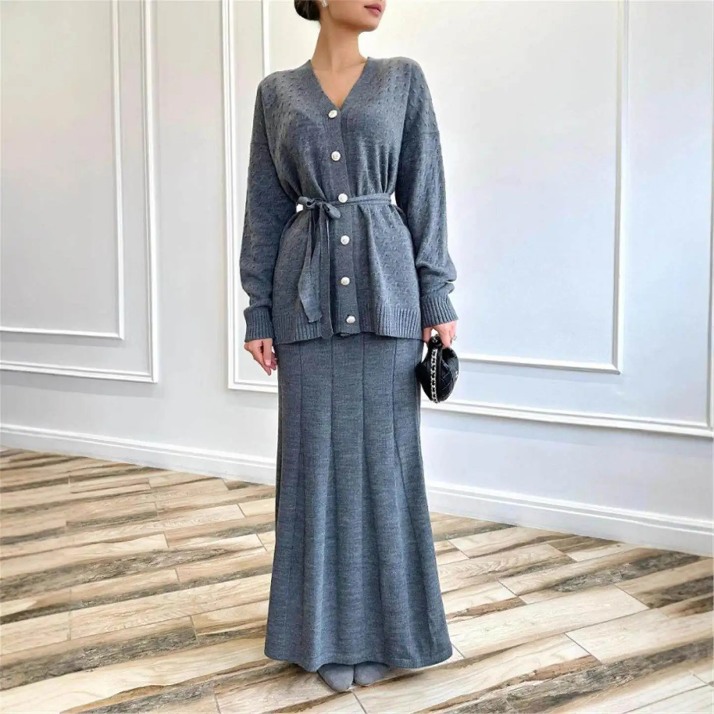 

Весенний комплект 2025: Женский однотонный костюм с длинным рукавом, пальто на пуговицах и юбка – модный трансграничный образ для женщин