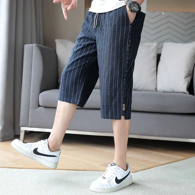 Panel de rayas de cintura alta para hombre, bolsillo suelto, informal, Delgado, recto, versátil, tres acortes, tendencia de moda de verano, 2023