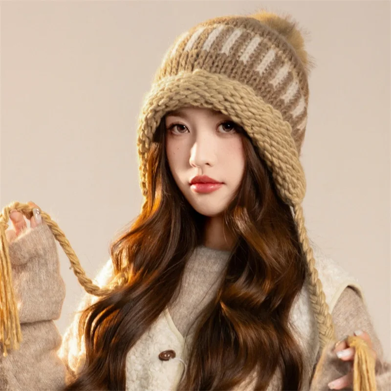 Women's autumn/winter spliced knitted hat. Pullover with long rope and pompom. Warm for outdoor. Knitted wool.