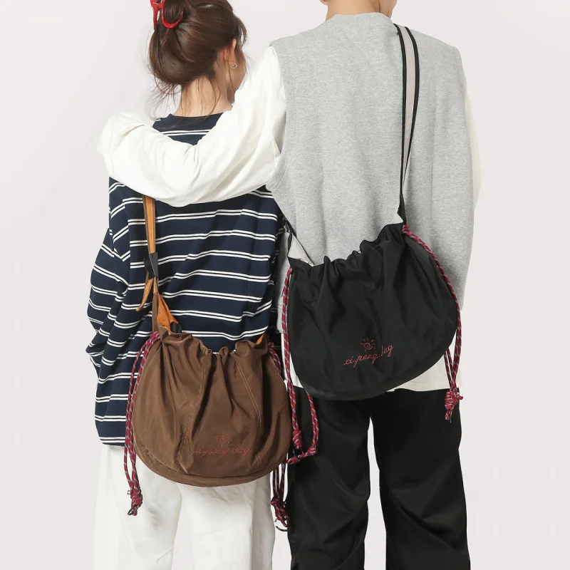 

Japanese Style Drawstring Casual Crossbody Bag for Women2025New lightweight shoulder bag large capacity commuter pleated canvas