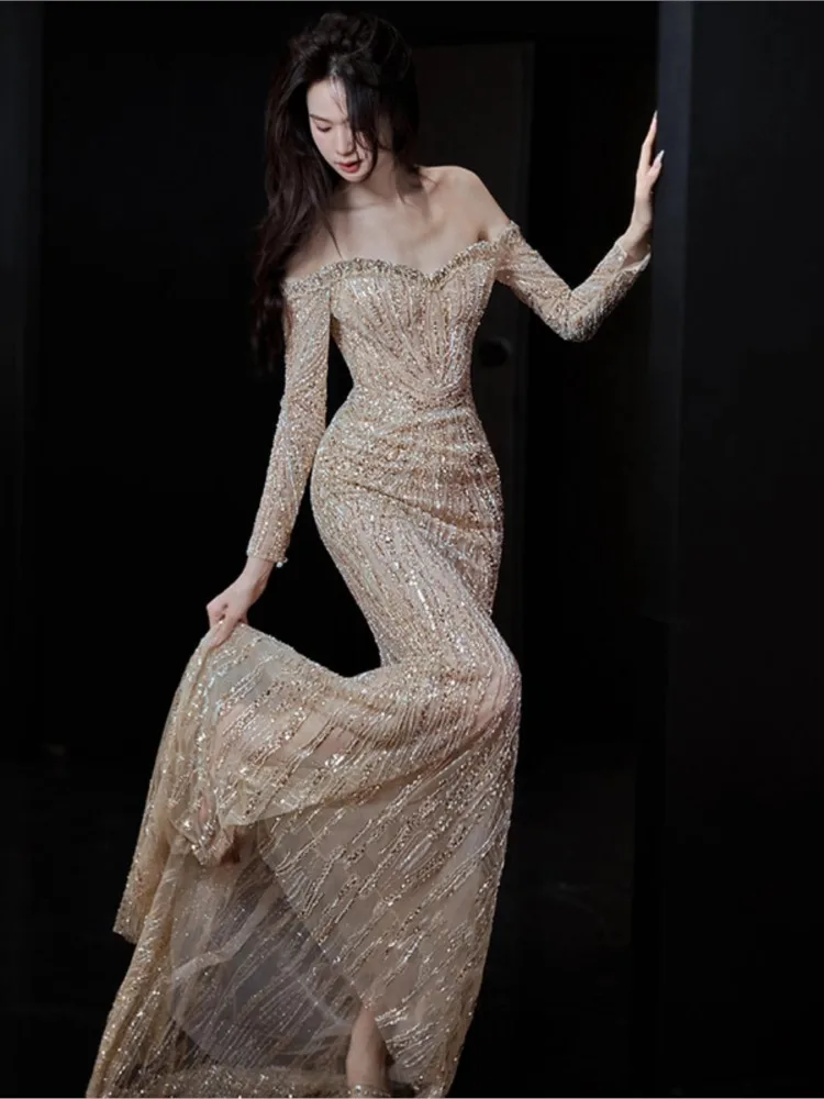 

One-shoulder golden toasting heavy fishtail long-sleeved dress