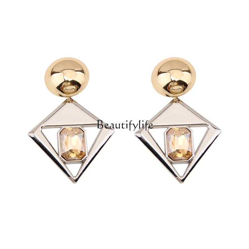 

Gold and silver contrasting rhombus earrings retro big gemstone earclip earrings.