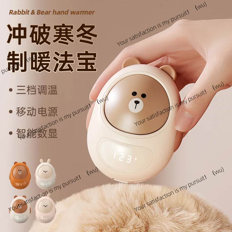 New cute pet cartoon mini hand warmer charging two-in-one power bank hand warmer mini portable heating hand warmer