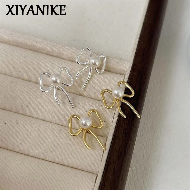 

XIYANIKE Elegant Pearl Bowknot Ear Stud Piercing Earrings For Women Girl Fashion New Jewelry Lady Gift Party Wedding сережки