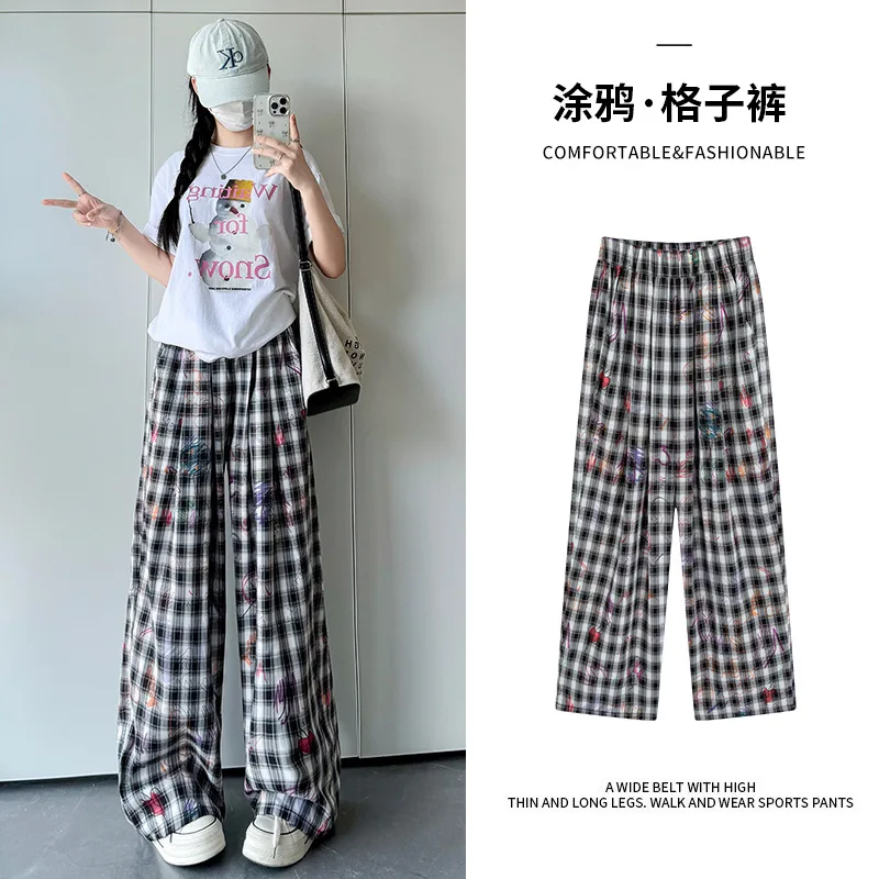 

Брюки в клетку с граффити в американском стиле, летние женские брюки, новые свободные прямые брюки с высокой талией, широкие брюки из ледяного шелка с принтом