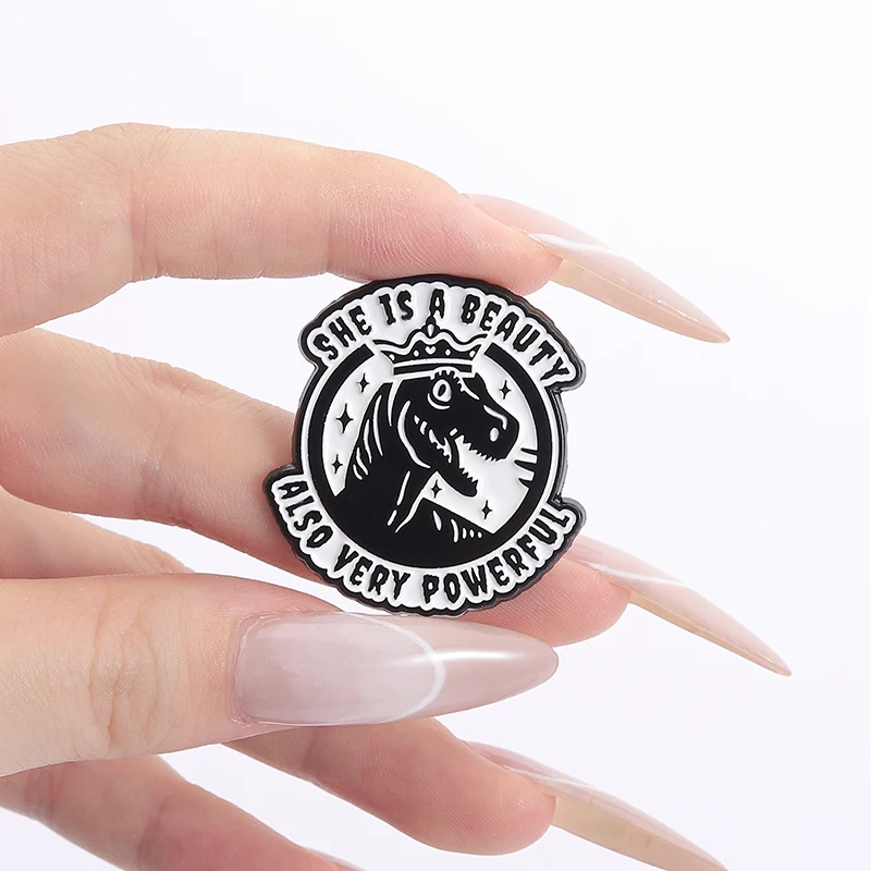 Dinosaur Queen Enamel Pins SHE IS A BEAUTY ALSO VERY POWERFUL Brooches Lapel Badge Backpack Clothes Jewelry Gift for Friends