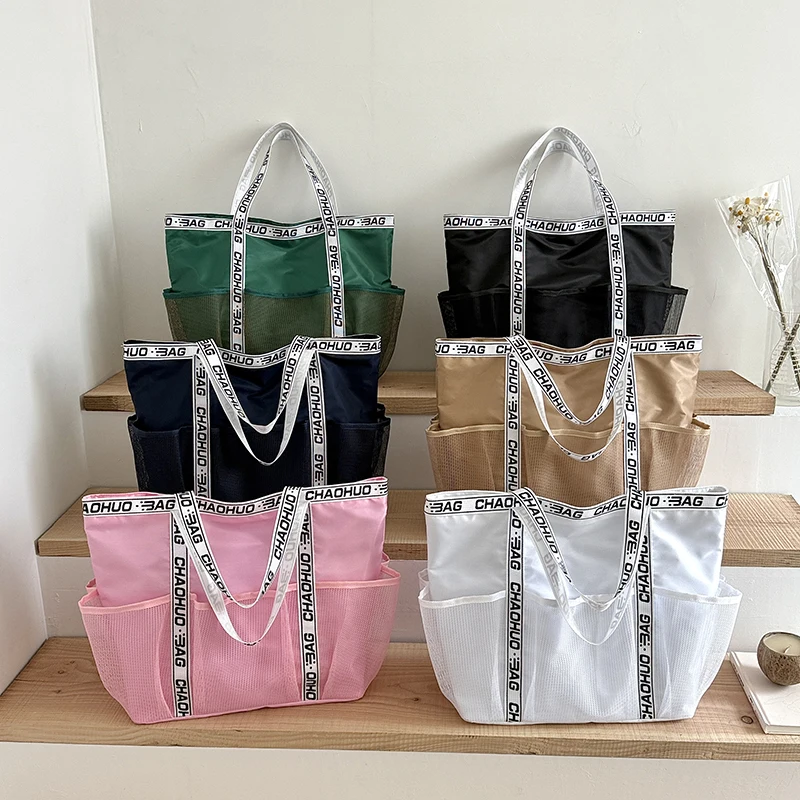 

﻿ Oversize Storage Mesh Beach Bag For Women Portable Travel Tote 6 Color Nylon Shoulder Bag Female Multi-pocket Handbag Large