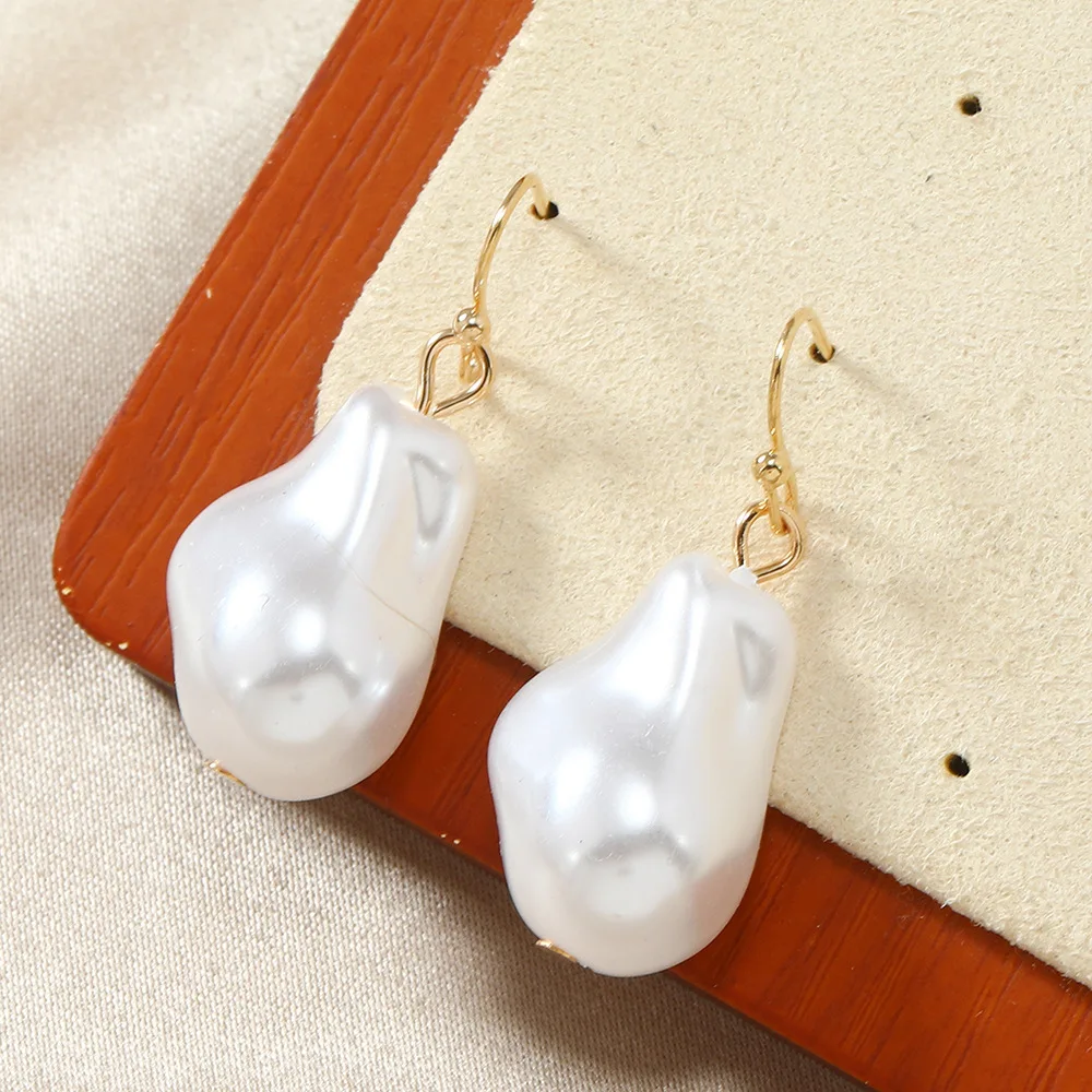 New Korean version simple and versatile irregular pearl baroque style cold wind temperament fringed small earrings women
