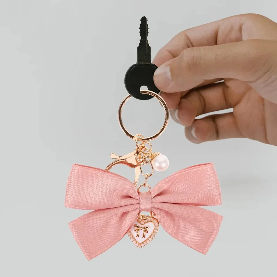 หวานริบบิ้น Bow Love Heart Charms พวงกุญแจ Bowknot โลหะจี้ Keyring กระเป๋าเครื่องประดับรถ Trinket อุปกรณ์เสริมของขวัญ
