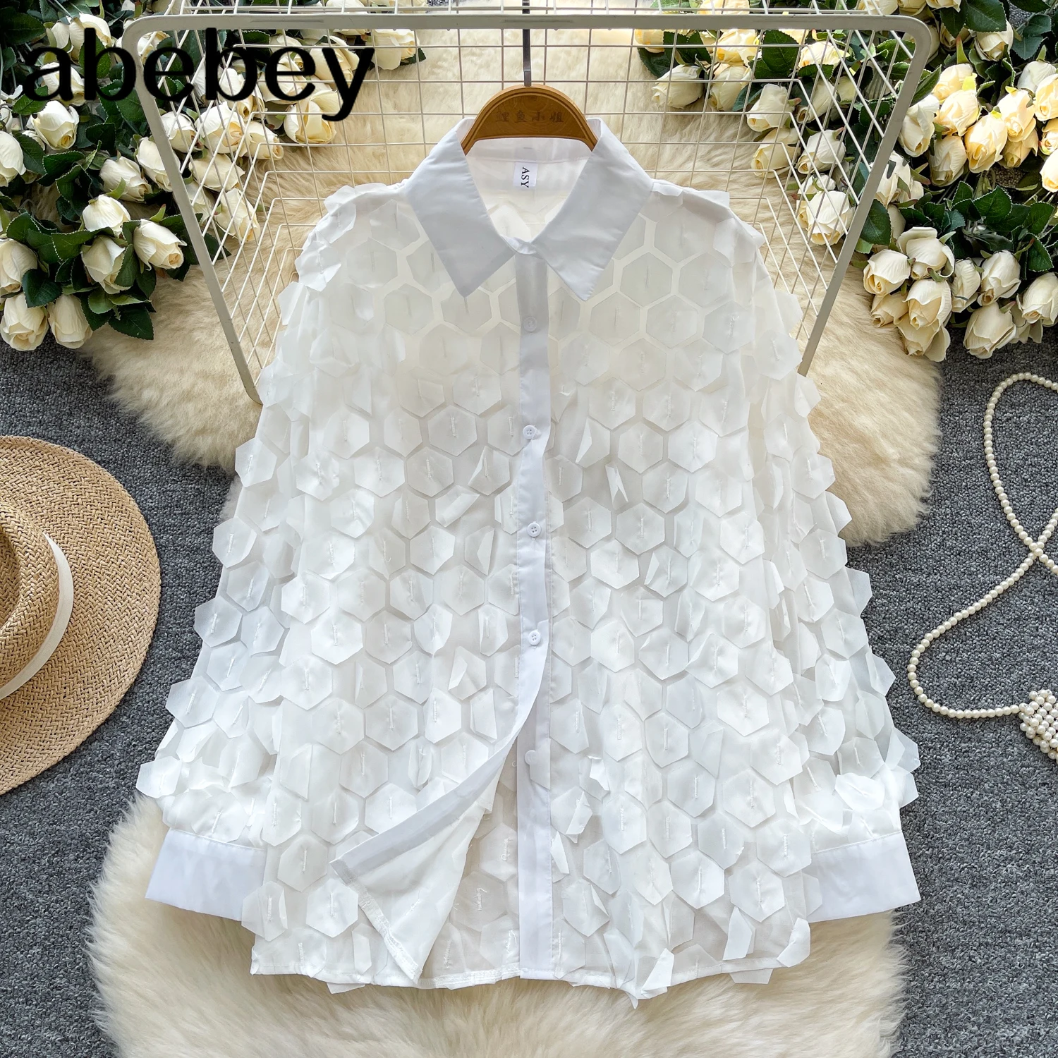 เสื้อเชิ้ตผู้หญิงทรงหลวม ดีไซน์ผ้าบางโปร่งลายปะติด สีพื้น กระดุมแถวเดียว เสื้อเบลาส์ แฟชั่นใหม่ ฤดูใบไม้ร่วง 2026