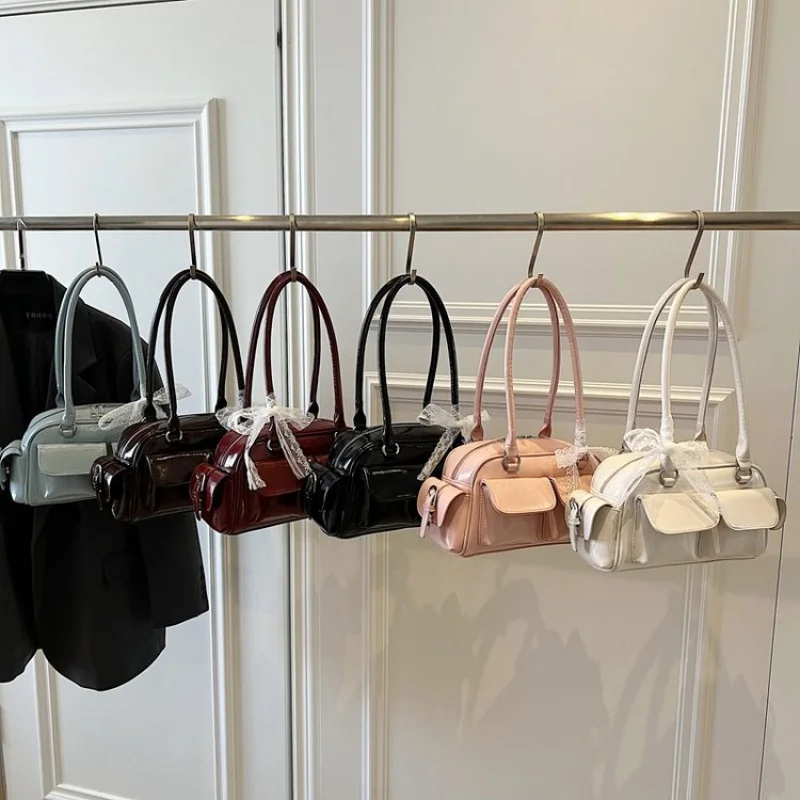 

Высококачественная женская большая сумка из прочной кожи с модным пригородным дизайном и известным аккуратным эффектом ​