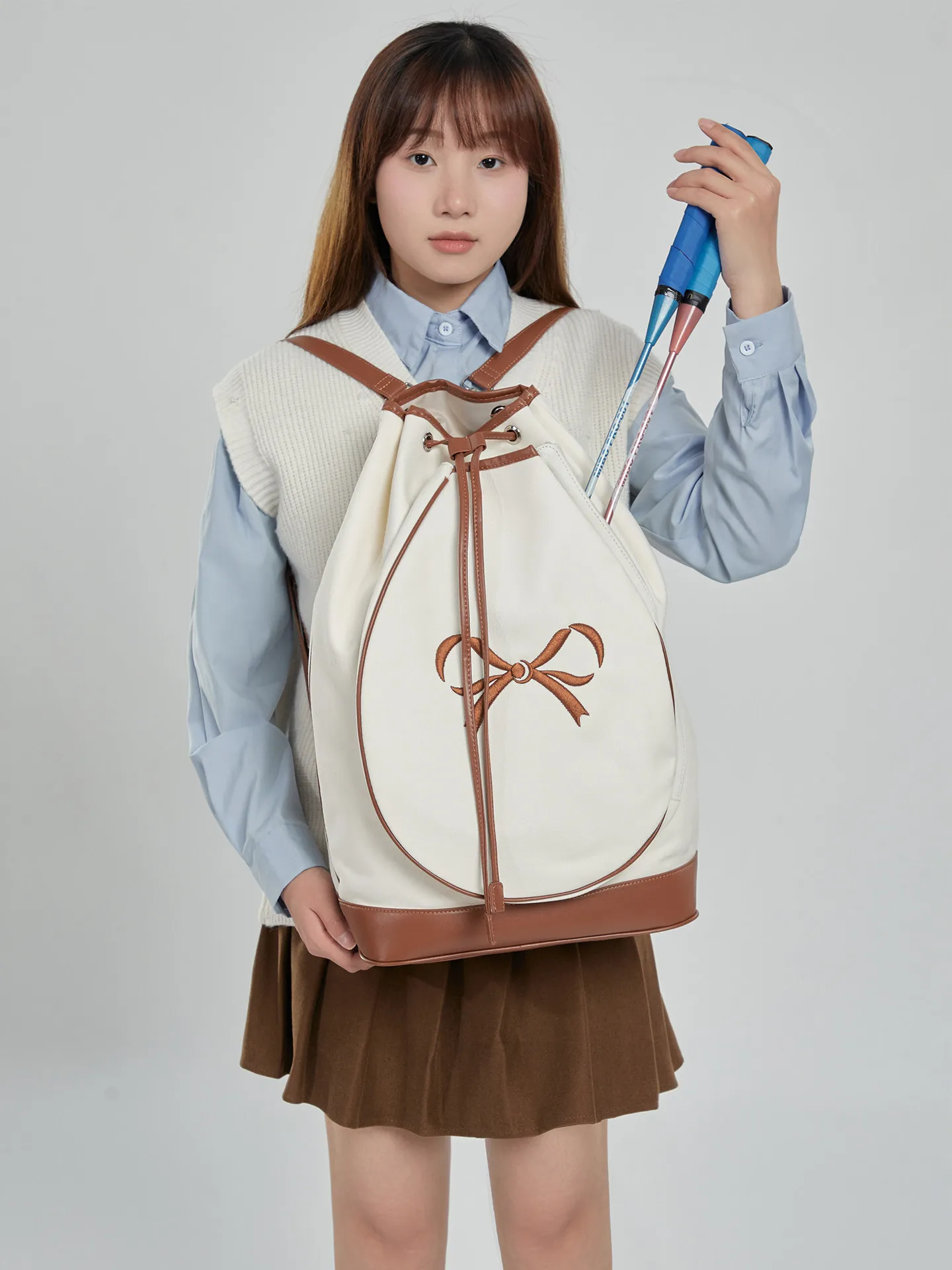 2026 Fashion New Splicing Color Contrasting Bucket Type Bow Pattern Decoration Outdoor Sports Tennis Canvas Backpacks For Women