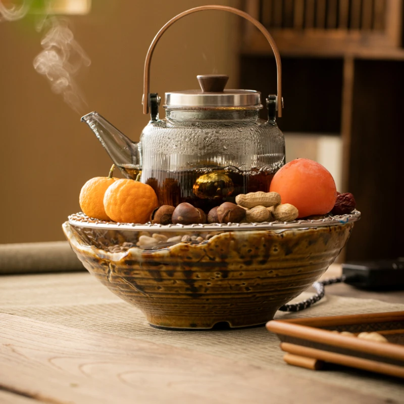 

A set of indoor electric pottery stoves, tea roasting jars, tea pots, and tea boiling utensils for household use