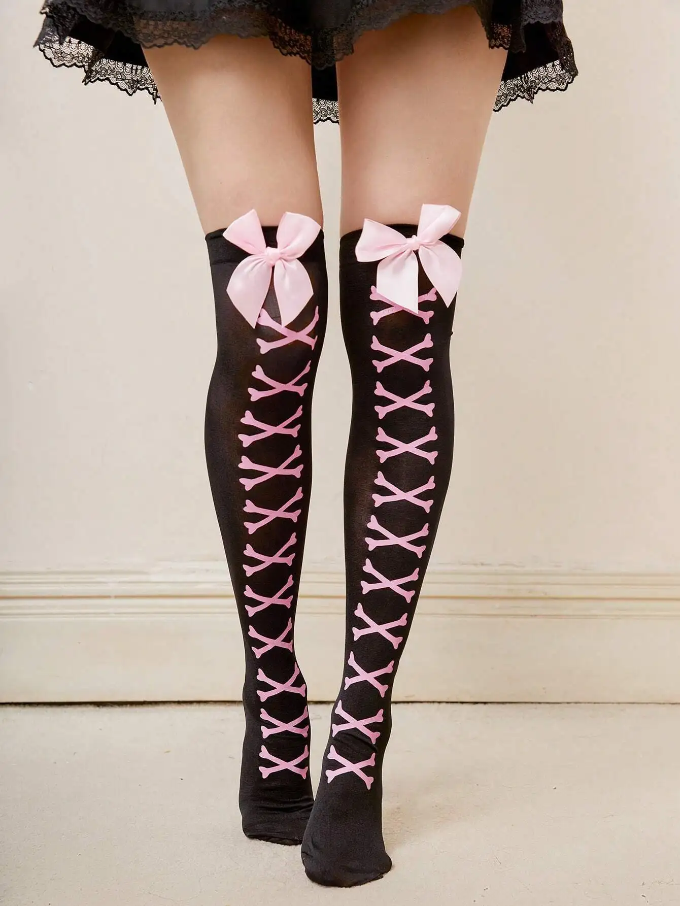 Black Over-the-Knee Socks with Pink Bone Pattern and Bow Detail