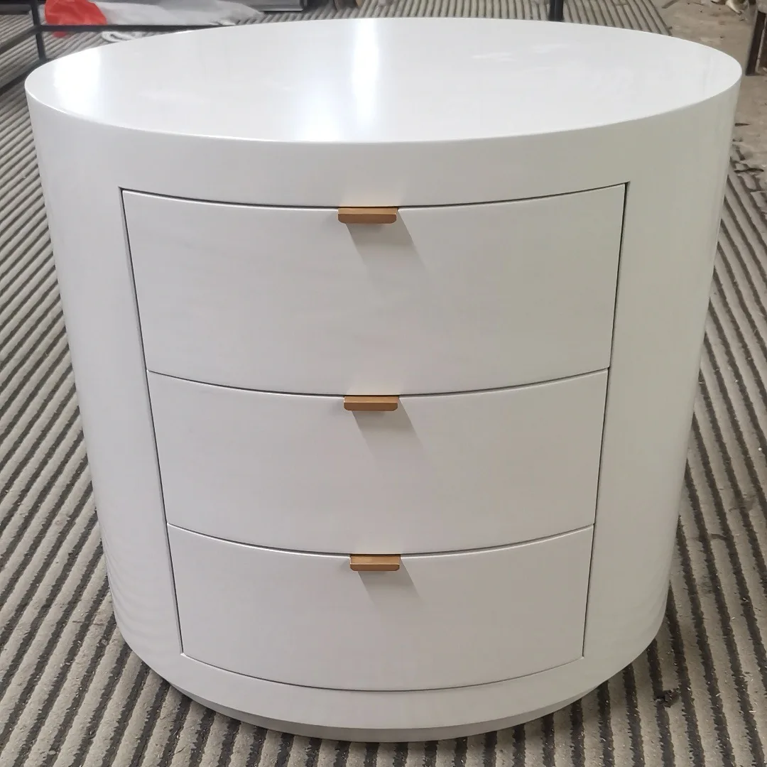 

Light luxury bedside table high end modern simple bedroom small leather solid wood round