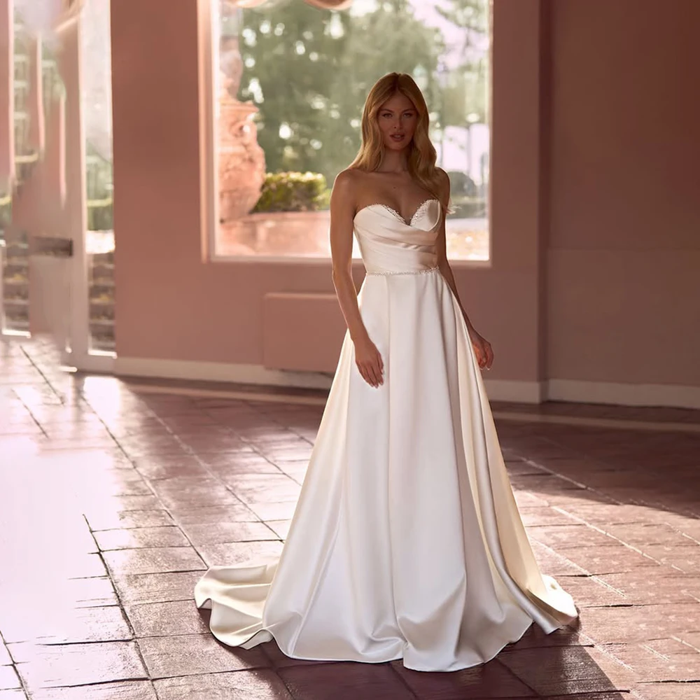 

Customized New Fashion Sweetheart Sleeveless Wedding Dress Satin A-Line Bride Dress Backless Zipper Wedding Gown