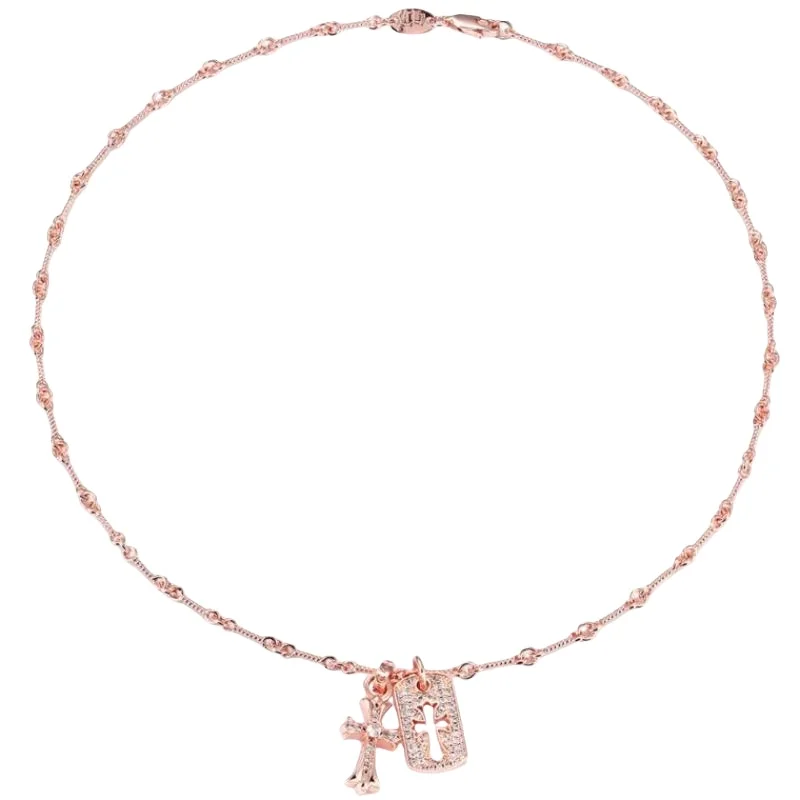 

Колье-подвеска с крестом и биркой, инкрустированное розовым золотом: элегантная готическая шикарная массивная деталь