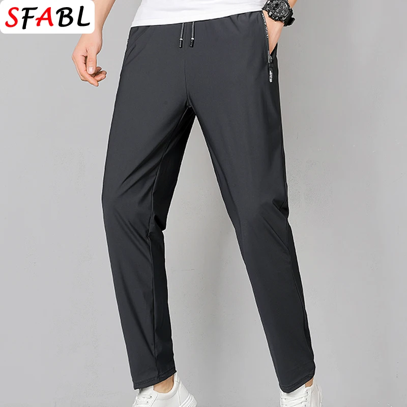 

Thin Gym Fitness Sweatpants Men Jogging Running Hiking Camping Sports Trousers Men Fashion Breathable Casual Pants Men Spring