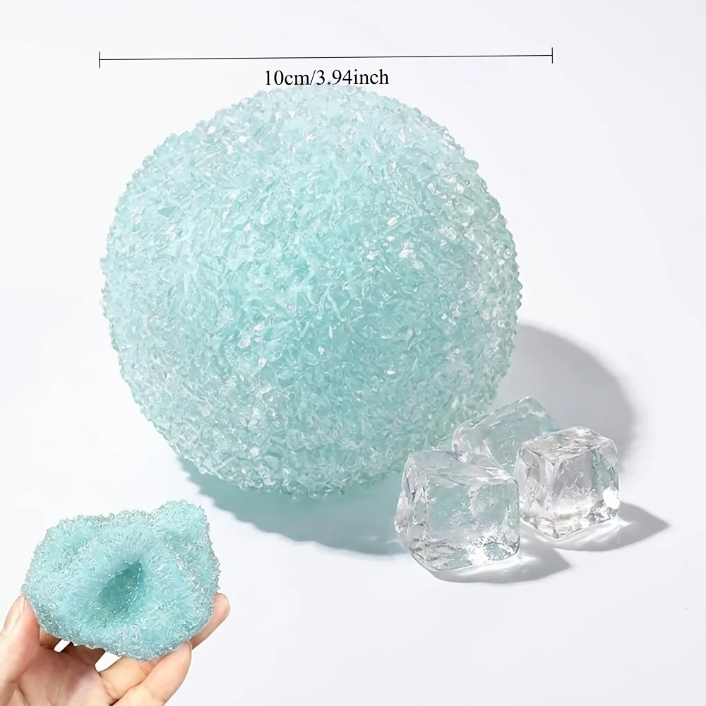 A stress-relief ball combining crispy, soft, and chewy textures with a satisfying crunch; a sensory squeeze ball with a slushie-like texture (light blue).