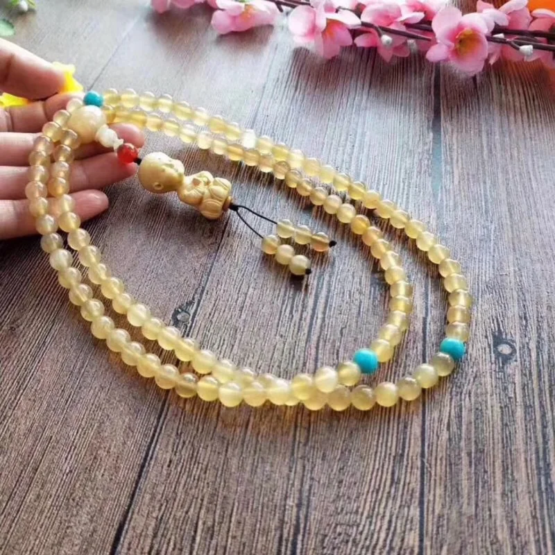 Natural horn , paired with amazonite , boxwood pendant, the beads are smooth and translucent