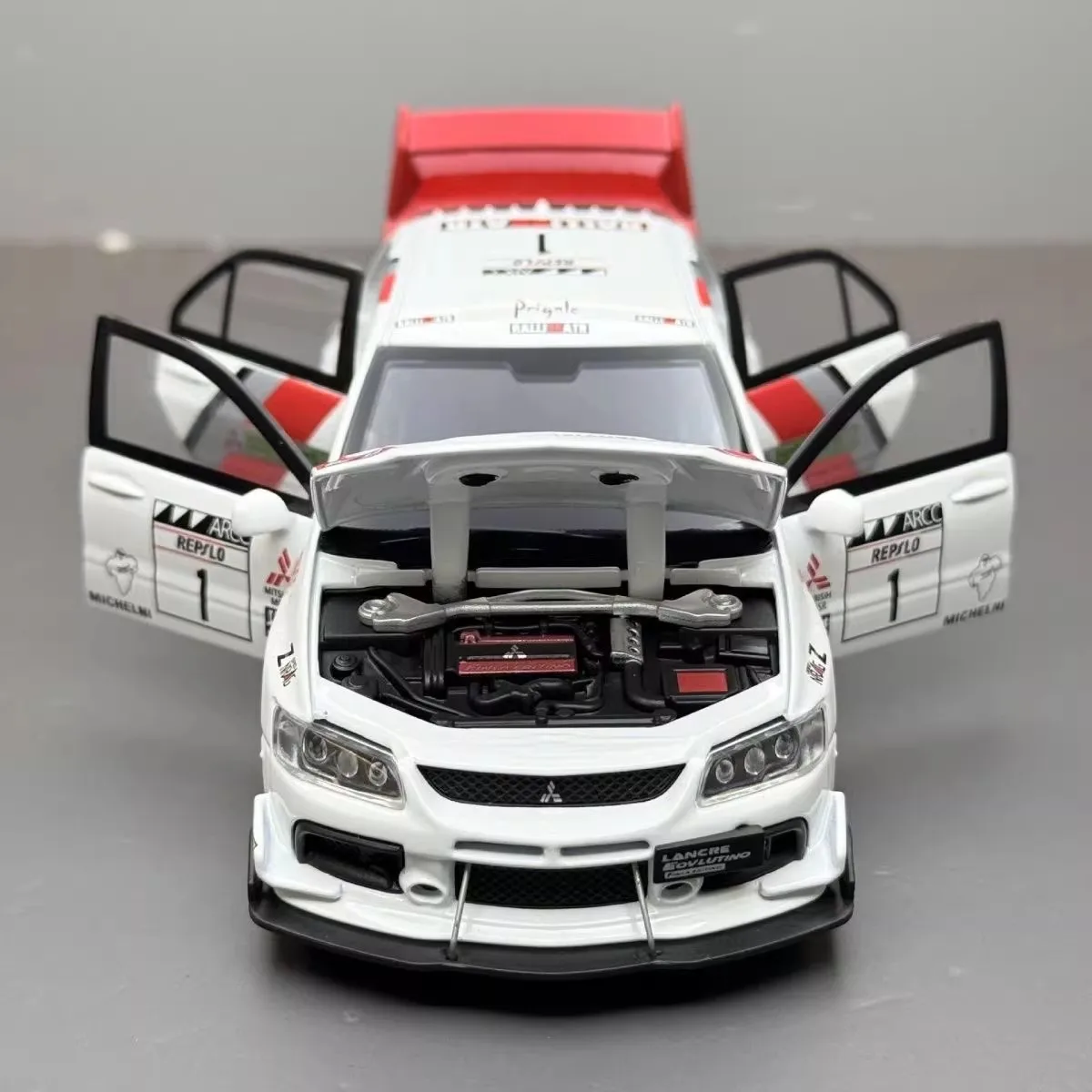 

Модель спортивного автомобиля Lancer Evolution EVO 1:32, игрушечная машинка из сплава с имитацией звука и света, подарок для детей