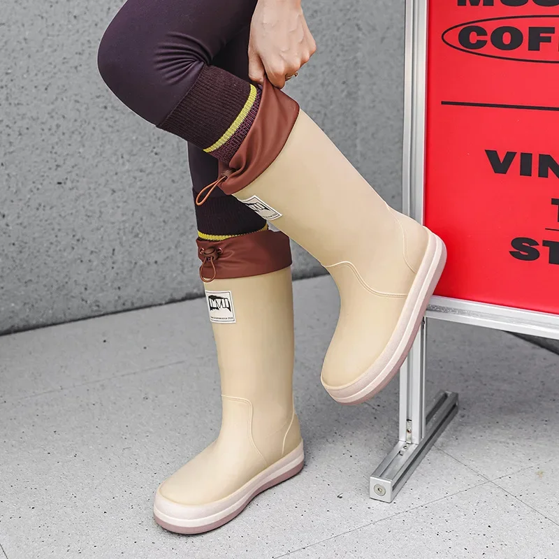 Botas de lluvia impermeables para hombre y mujer, zapatos antideslizantes de goma, a la moda, para trabajo y Pesca