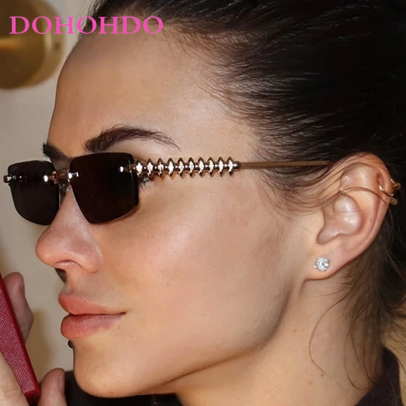 

2025 Fashion Cat Eye Rimless Metal Legs Women Sunglasses Luxury Designer Punk Men Shades Outdoor Travel Sunglasses Ladies UV400