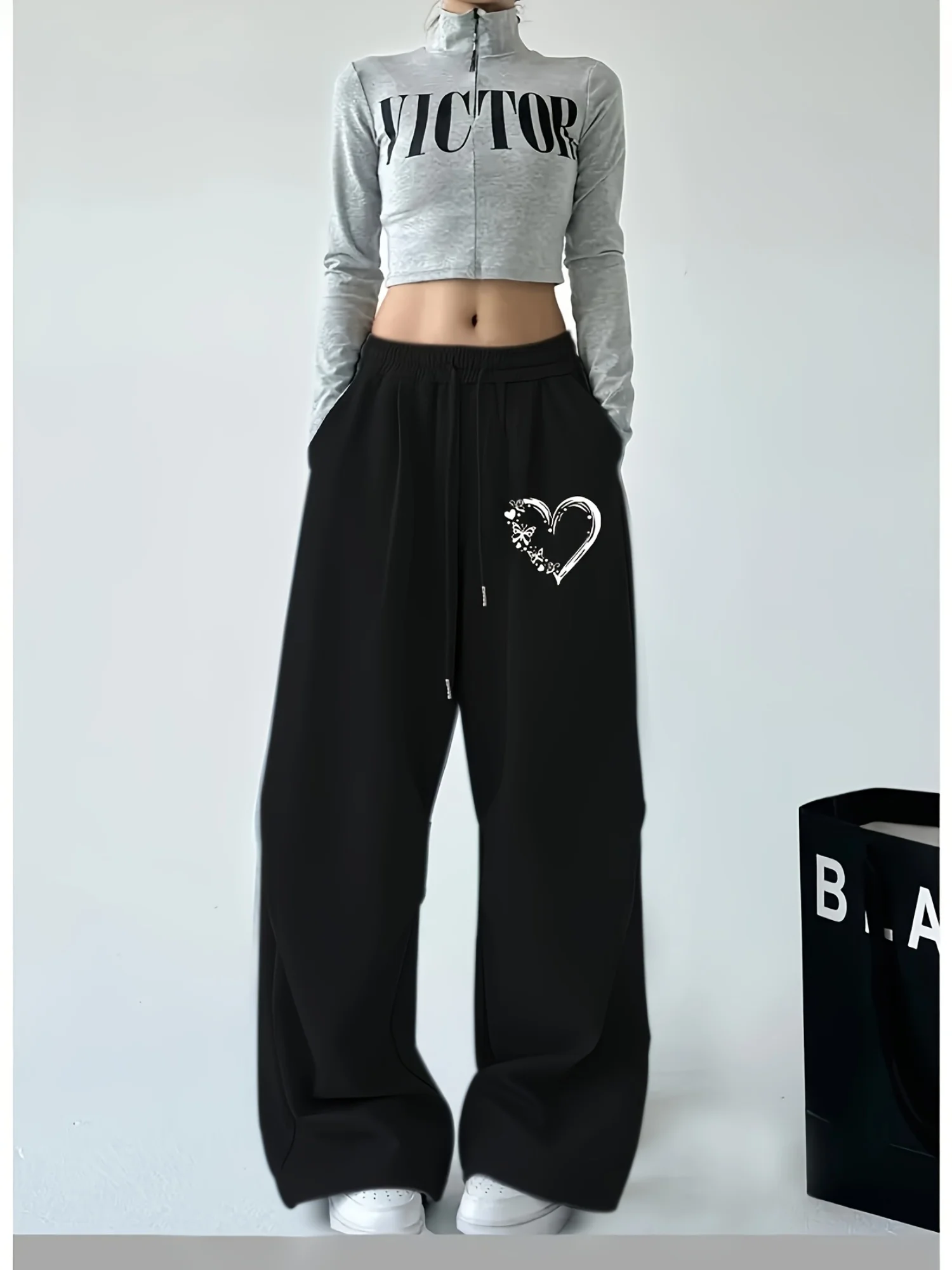 Damen Herbst und Winter Plus-Size-Herzdruck Lose gerade Fleece-Bein-Jogginghose Elastischer Bund Streetwear Vielseitig