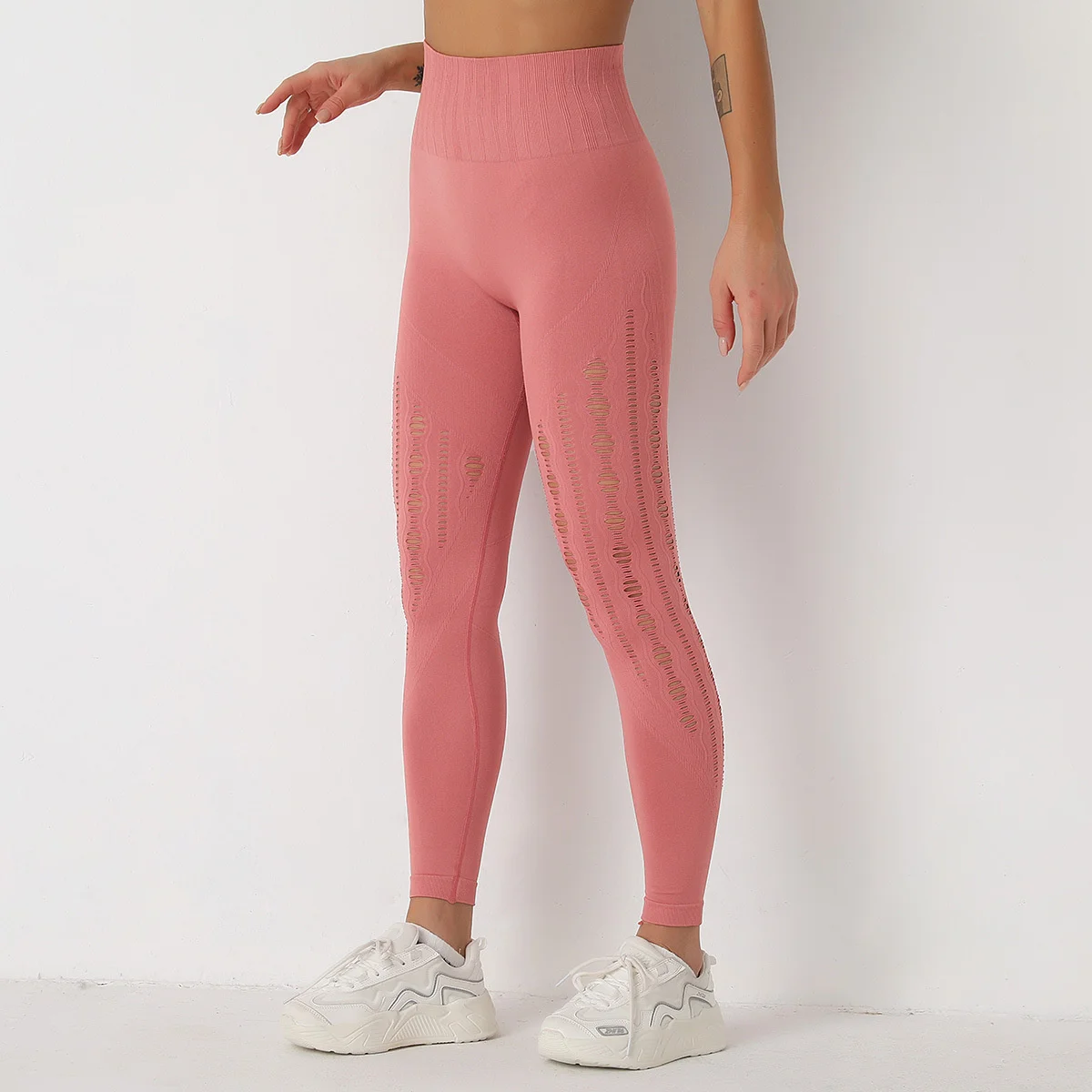 Pantaloni sportivi in rete da donna con glutei Color pesca traspirante colore puro pantaloni da Yoga senza cuciture ad asciugatura rapida Leggings Fitness a vita alta da donna