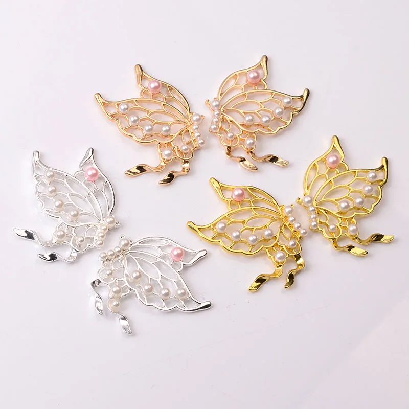 Handmade DIY alloy symmetrical butterfly accessories retro large hollow pearl butterfly brooch material jewelry wholesale