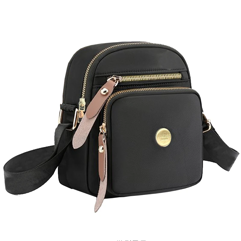 Neutrale, kompakte Mini-Taschen für Damen und Herren, ideal für Reisen und Ausflüge, mit einem schlichten Design für die Nutzung über eine Schulter. – Detail 6