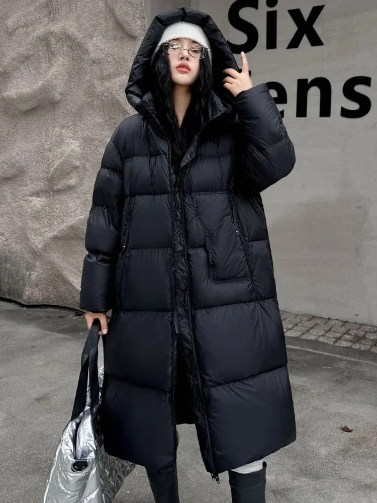 Femmes nouveau automne hiver épaissi chaud vers le bas vêtements dame longue à capuche moelleux doudoune mode décontracté vers le bas manteau femme 2025