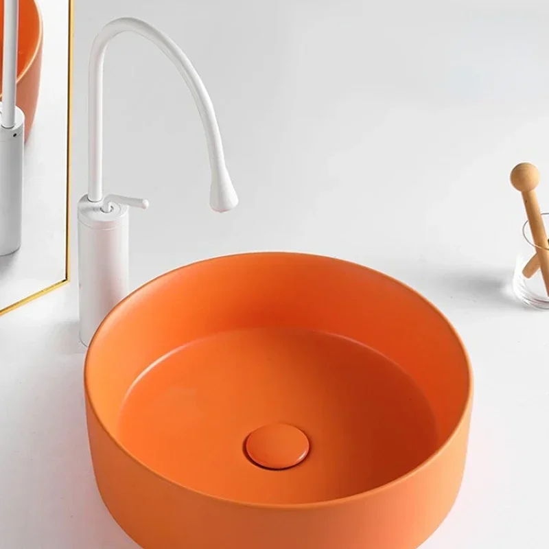 FOR Nordic stage basin Orange circular wash  Single  Small size Orange creative balcony Ceramic household wash basin