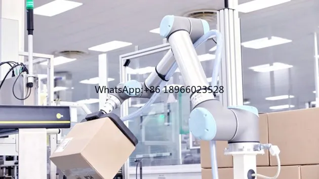 Collaborative Robot UR10e Cobot Arm With Robotic Vacuum Gripper As Warehouse Automatic Handling Robt