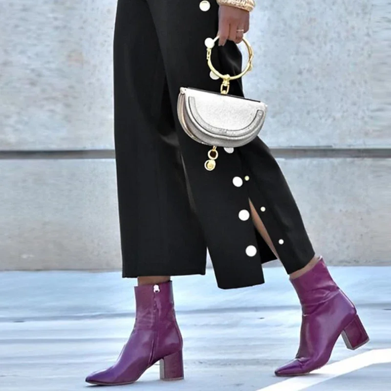 Pantalones tobilleros negros de pierna ancha para mujer, detalle de botón lateral, dobladillo dividido, cintura alta, pantalones sueltos informales para oficina urbana